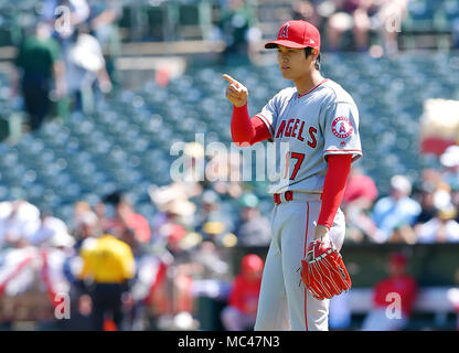 Los Angeles Angels Shohei Ohtani comes out of the clubhouse with his arm  iced, for an interview with Japanese tv, after the game against the Oakland  Athletics at Angel Stadium in Anaheim