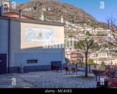 sundial on the wall in Moltrasio, medieval village.lake of como, italy Stock Photo