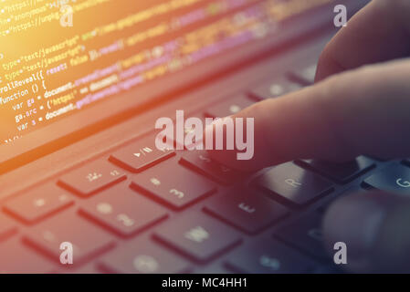 Closeup coding on screen, hands coding html and programming on screen laptop, web development, developer Stock Photo