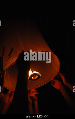 Yi Peng flying flame lantern in Chiang Mai Kratong Festival in Thailand Stock Photo