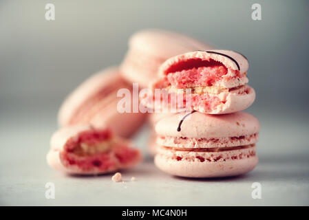 Pink french macaroons. Pastel colors macarons with copy space, top view. Holidays and celebrations concept. Sweet gift for woman, girl Stock Photo