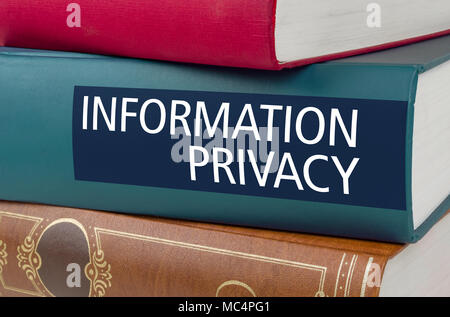 A book with the title Information Privacy written on the spine Stock Photo