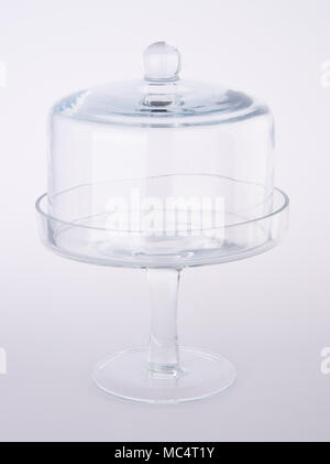 transparent retro cookie jar on white kitchen table with black and