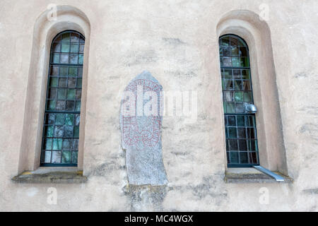 Heda church is built in 12th century and has two rune stone in the outer walls Stock Photo