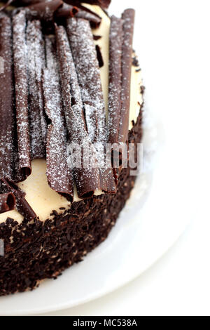 Close up of Chocolate cake with chocolate curls and crushed chocolate Stock Photo