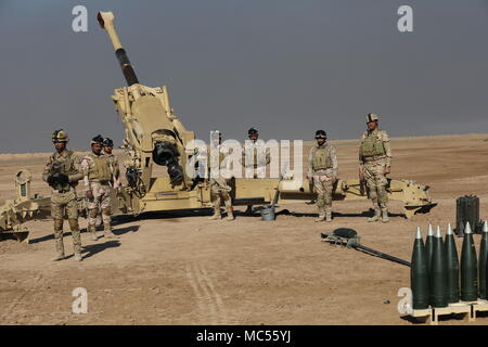 Iraqi army soldiers stand by for a fire mission with their M198 155 mm howitzer as part of their training from French forces at the Besmaya Range Complex, Iraq, Jan. 31, 2018.  More than 74 Coalition members have committed themselves to the goal of eliminating the threat posed by ISIS in Iraq and Syria and have contributed in various capacities to the effort. (U.S. Army photo by Master Sgt. Horace Murray)