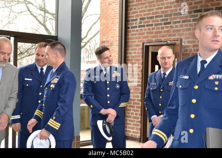U.S. Coast Guard and Hampton University members are personnel participating in a Memorandum of Agreement event at Force Readiness Command in Yorktown, Virginia. The archival photographic print documents the meeting prior to the formal MOA signing associated with the College Student Pre-Commissioning Initiative. Stock Photo