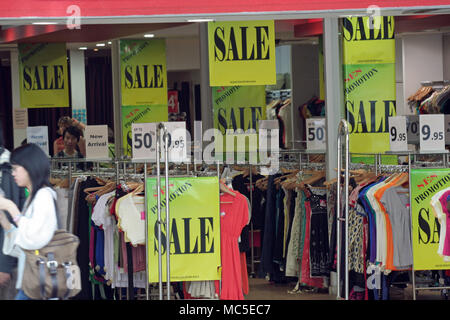 WOMEN'S CLOTHING SHOP OFFERING SALE ON ORIGINAL PRICE OF STOCK. SYDNEY, NSW, AUSTRALIA. Stock Photo