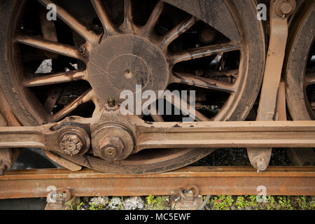 Close-up, detail, grease nipple and connecting bolts, drive linkage of old steam train, abstract, object, wheel Stock Photo