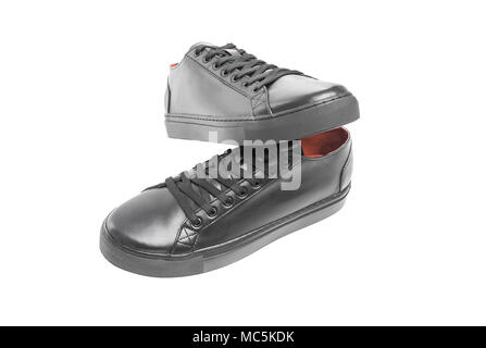 Black leather sneakers. Stock Photo