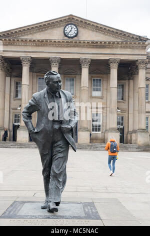 Statue of Harold Wilson outside Huddersfield Railway Station — a tribute to the former Prime Minister in his hometown. Stock Photo