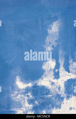 Blue and white painted cracking wall texture background. Stock Photo
