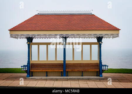 A seated rain shelter along the top of Whitby's West Cliff area on 12 April 2018 Stock Photo