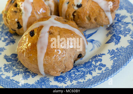 Authentic homemade hot cross buns from the home kitchen. Stock Photo