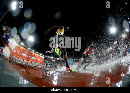 Uganda's Albert Chemutai in action in the Men's 3000m Steeplechase Final at the Carrara Stadium during day nine of the 2018 Commonwealth Games in the Gold Coast, Australia. Stock Photo