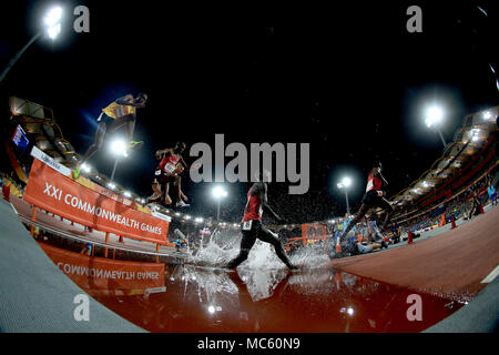 Kenya's Abraham Kibiwott (centre) in action in the Men's 3000m Steeplechase Final at the Carrara Stadium during day nine of the 2018 Commonwealth Games in the Gold Coast, Australia. Stock Photo