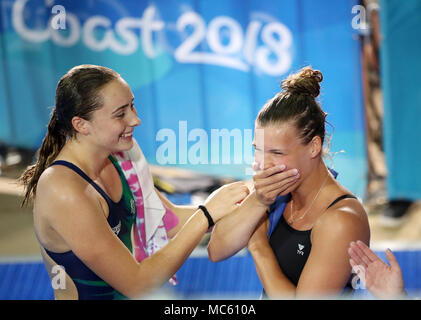 Scotland's Grace Reid (right) celebrates Gold in the Women's 1m Springboard Final at the Optus Aquatic Centre during day nine of the 2018 Commonwealth Games in the Gold Coast, Australia. Stock Photo