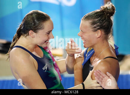 Scotland's Grace Reid (right) celebrates Gold in the Women's 1m Springboard Final at the Optus Aquatic Centre during day nine of the 2018 Commonwealth Games in the Gold Coast, Australia. Stock Photo