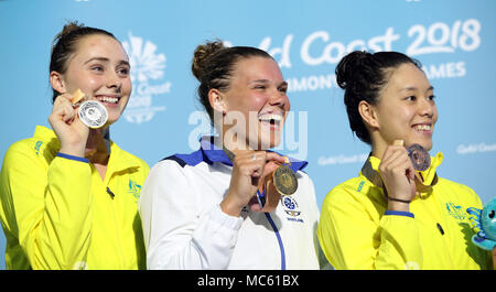 Scotland's Grace Reid (centre) celebrates with her Gold medal in the Women's 1m Springboard Final at the Optus Aquatic Centre during day nine of the 2018 Commonwealth Games in the Gold Coast, Australia. Stock Photo