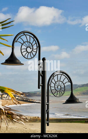 A typical street light in Lyme Regis with the characteristic ammonite design. Stock Photo