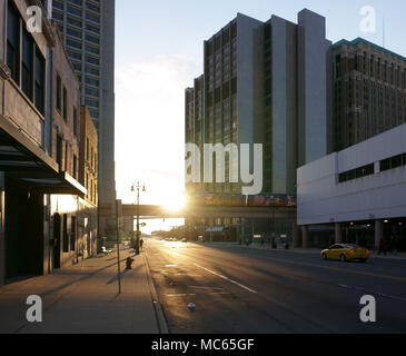 Empty street and boulevard with a view on the Detroit Peolple Mover at the end of the day. Stock Photo