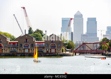 Skyscrapers in Canary Wharf seen from Shadwell Basin in London - No Logos Stock Photo