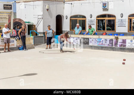 Men and ladies playing boules bocci on the seafront at St Paul's, malta ...