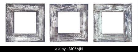Three empty old weathered picture frames isolated on white. Stock Photo