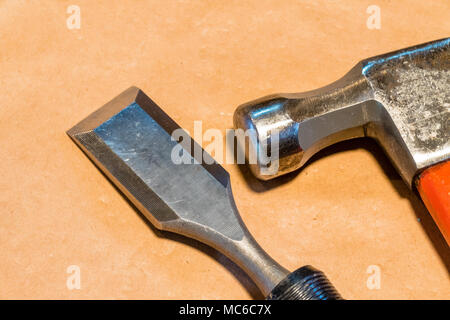 chisel and hammer on the work bench Stock Photo