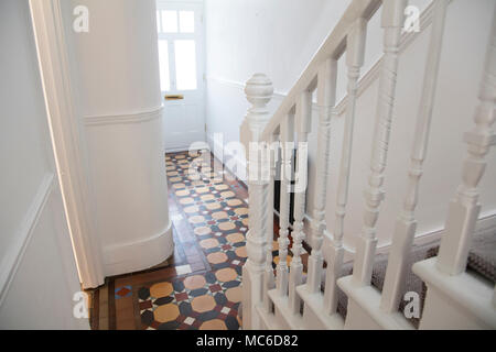 House entrance hall with period feature victorian tiles Stock Photo