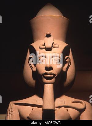 EGYPTIAN MYTHOLOGY - Akhenaten. Granite statue of the Pharaoh Amenophis IV, later known as Akhenaten - the husband of the beautiful Nefertiti. Facsimile in the Egyptian Museum, San Jose Stock Photo