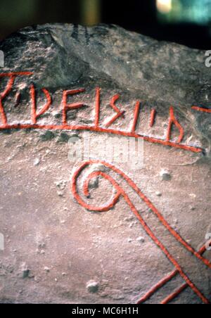 Details of runes on Scandinavian rune stone bearing interlace dragon ...
