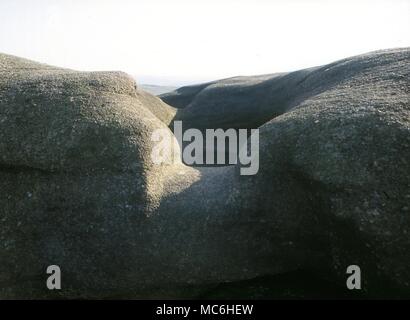 Ley Lines. The Doubler Stones on Ilkley Moor, Yorkshire. These stones were a sacred site in prehistoric times and part of an extensive ley. Man made water hole. Stock Photo