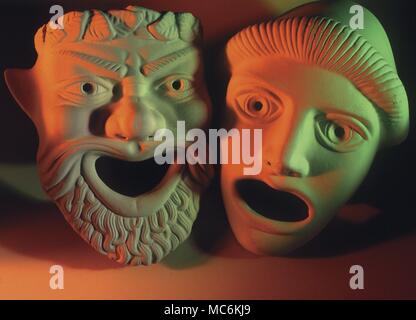 Greek actors' masks. Pair of theatre masks, based on ancient Greek originals: sometimes called Comedy and Tragedy Stock Photo