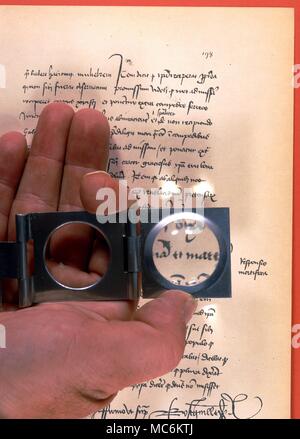 Graphology. Examining the handwriting on a court document from the trial of Joan of Arc, Stock Photo