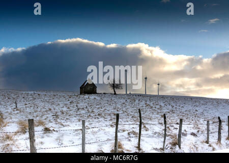 Wind turbines of the Cezallier windfarm, Puy de Dome, Auvergne, France Stock Photo