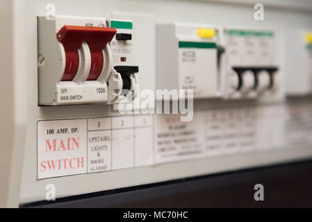 Close up of a MCB (Micro Circuit Breaker) on a UK domestic electrical consumer unit or fuse box Stock Photo