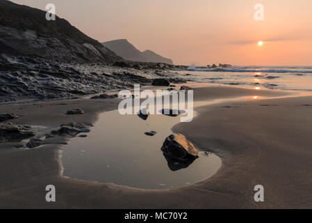 Rocks pools on the beach at Crackington Haven on the North Cornish Coast Stock Photo