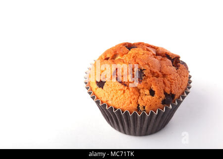 Tasty chocolate cupcakes, muffins on a white wooden table. Stock Photo