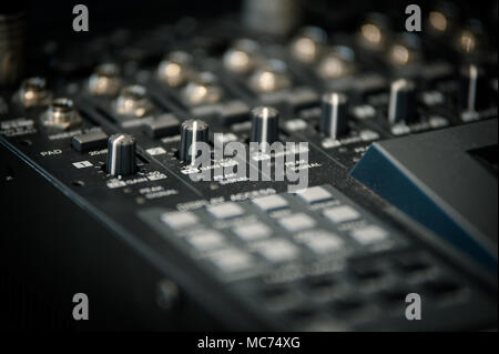 Mixing desk mixer event live audio fader knobs Stock Photo