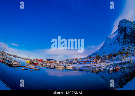 SVOLVAER, LOFOTEN ISLANDS, NORWAY APRIL 09, 2018: Outdoor view of some boats in the harbor with buildings behind in Svolvaer, in March International cod fishing competition Stock Photo