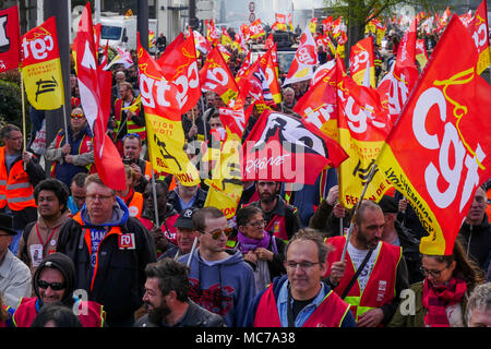 Lyon, France, 13th April 2018: Called by trade unions, SNCF employees are seen in Lyon (Central-Eastern France) on April 13, 2018 as they march in Part-Dieu area on the fifth day of action against status reform engaged by French Government.  Credit: Serge Mouraret/Alamy Live News Stock Photo