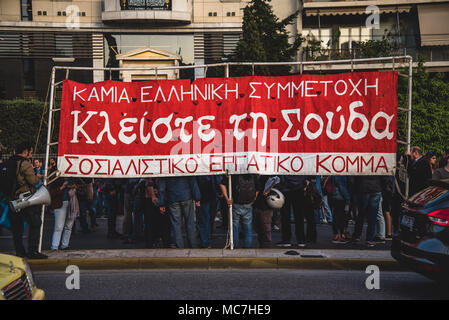 Athens, Greece. 13th Apr, 2018. Protesters seen holding a large banner during the protest.Anti-war concentration by various social communities. With slogans such as ''The navy should leave the Aegean and the Mediterranean sea'' and ''Yes to Friendship and Solidarity of People'' after a march, hundreds of protesters arrived outside the US Embassy in Athens. Credit: Vangelis Evangeliou/SOPA Images/ZUMA Wire/Alamy Live News Stock Photo