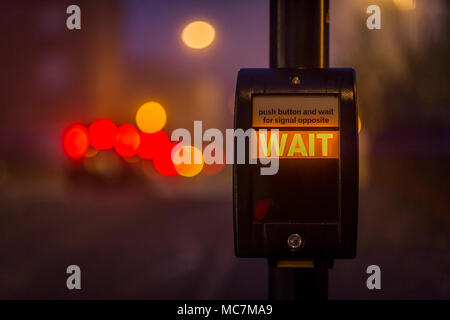 Pedestrian call button at a crossing in the UK. Stock Photo