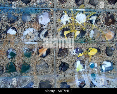 Abstract Grunge Paint Marks on Flint and Cement Wall Stock Photo