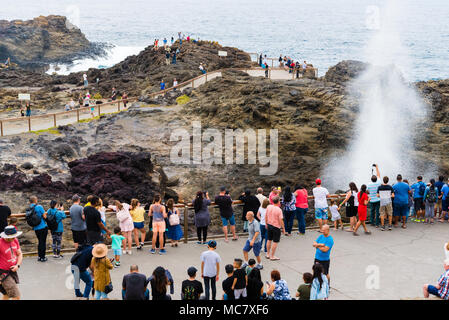 Kiama, NSW, Australia-March 31, 2018: Tourists visiting Kiama Blowhole, one of the largest blowholes in the world, a sea-cliff cavern that spouts seaw Stock Photo