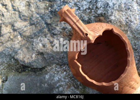 empty Amphora top view in the garden with stone background Stock Photo
