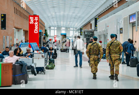 Venice,Italy on 28th Mar 2018: Italian army soldiers patrol the passenger hall at Marco Polo International Airport in Venice Stock Photo