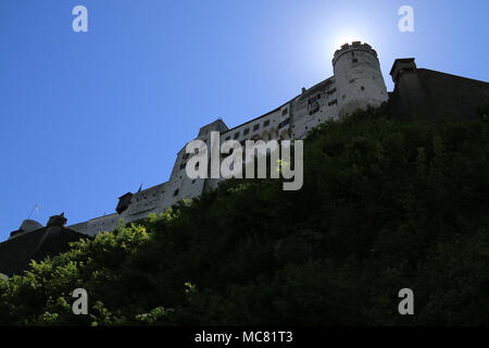 Hohensalzburg Fortress sits on top of the Festungsberg right above the historic old town of Salzburg, Austria Stock Photo