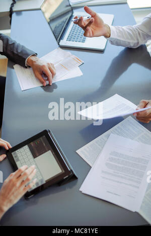 Colleagues collaborating on team project Stock Photo